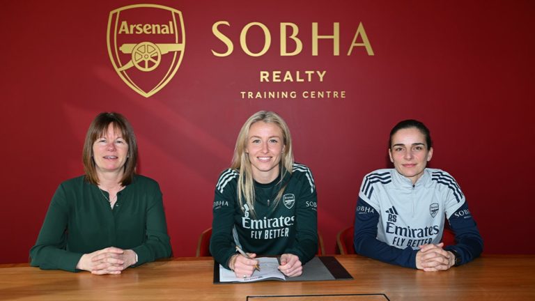 Leah-signing-contract_vcwbq4b5.jpg