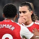 liverpool-england-jurrien-timber-of-arsenal-speaks-with-teammate-riccardo-calafiori-during_m2csd9yq.jpeg