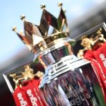 liverpool-england-a-detailed-view-of-the-premier-league-trophy-dressed-in-red-ribbons-prior_zax0l92y.jpeg