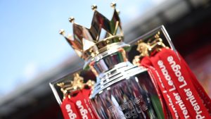 liverpool-england-a-detailed-view-of-the-premier-league-trophy-dressed-in-red-ribbons-prior_zax0l92y.jpeg