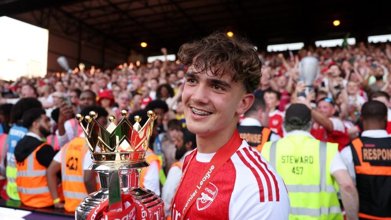 london-england-max-dowman-of-arsenal-celebrates-with-the-premier-league-trophy-as-arsenal-are_wf522m.jpeg